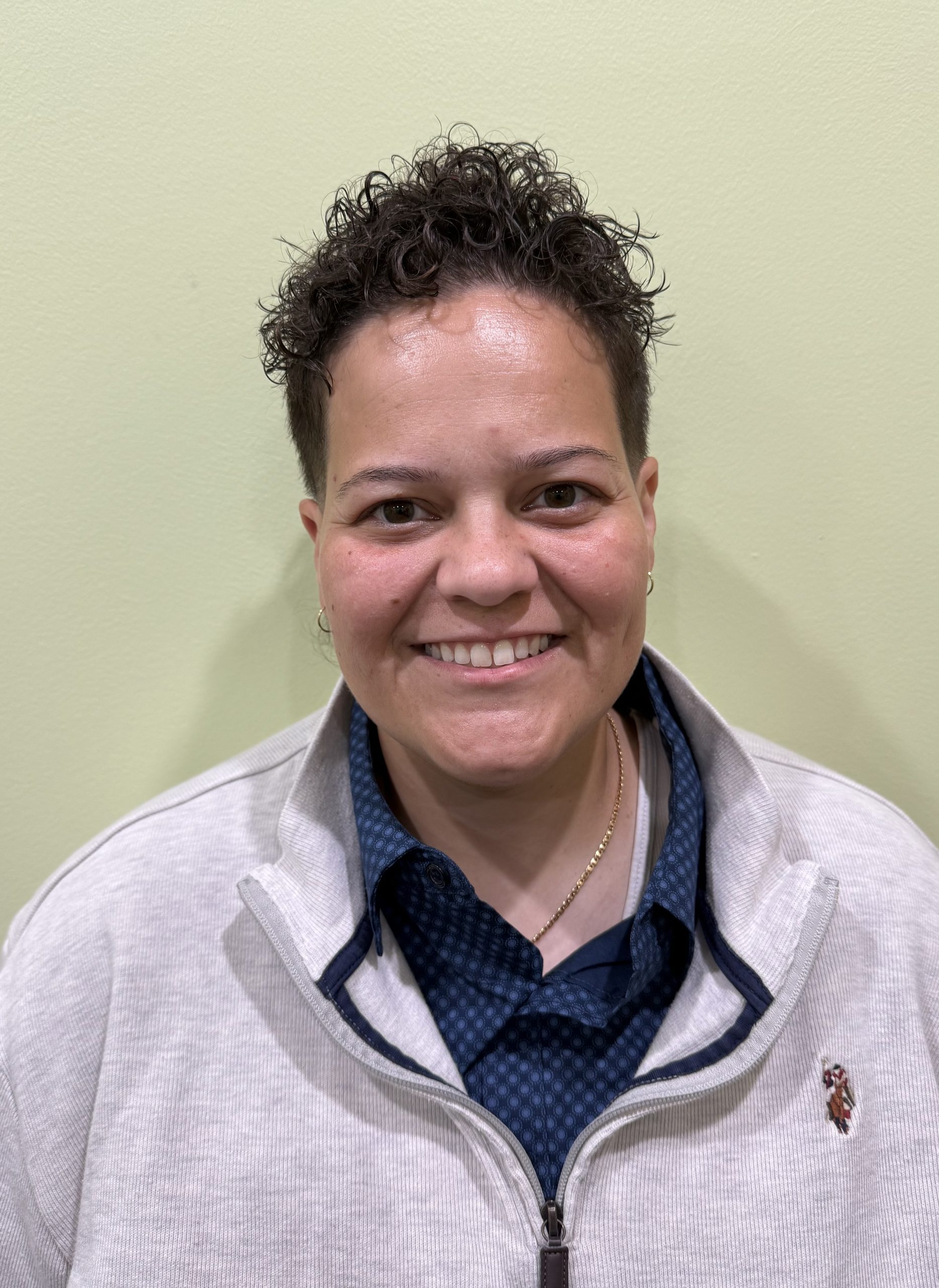 Nurse practitioner Queen Ajiere, Zoelife Psychiatric Services team member, smiling portrait